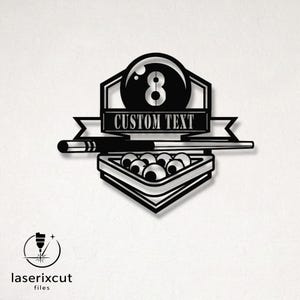 May include: Black and white metal wall art featuring a billiards theme. The design includes an eight ball, a cue stick, a rack of billiard balls, and a banner that reads "CUSTOM TEXT". The logo for laserxcut files is in the lower left corner.
