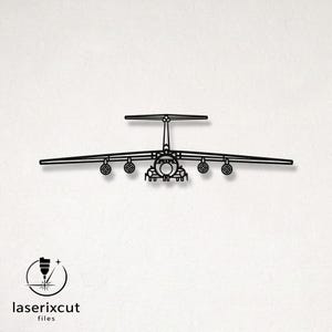 May include: Black laser-cut metal airplane silhouette. The design features a detailed outline of an aircraft, including wings, engines, and tail. The image includes the text "laserixcut files" and a logo.