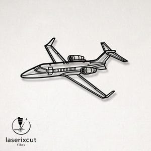 May include: Black metal wall art of a private jet. The jet has two engines, wings, and a tail. The image includes the text "laserixcut files" and a logo of a laser cutting a design.