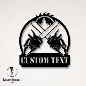 May include: Black metal wall art featuring crossed chainsaws, a circular saw blade, and a pine tree silhouette. The design includes a banner with the text "CUSTOM TEXT" and the "laserixcut files" logo.