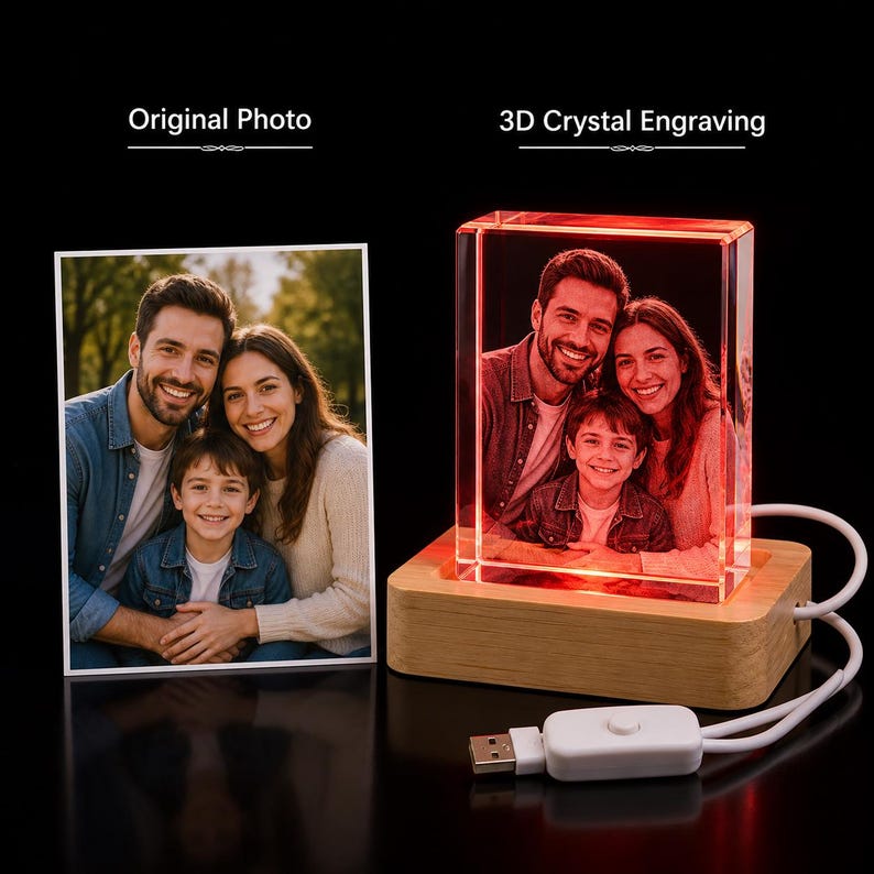 May include: A rectangular glass block featuring a 3D laser-engraved portrait of a family, illuminated by a red light from a wooden base with a USB power cord. Next to it is a printed photograph of the same family, labeled Original Photo.