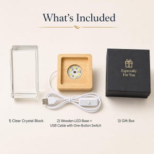 May include: A set including a rectangular clear crystal block, a square light-colored wooden LED base with a white USB cable featuring a one-button switch, and a black gift box with the gold text Especially For You and a gift icon printed on top.