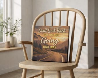 Non guardare indietro, non stai andando in quella direzione. Quadro su tela con messaggio motivazionale.