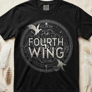 May include: Black t-shirt featuring a circular design with the text "FOURTH WING" in silver lettering. The design includes two stylized winged creatures and the words "FLY...OR DIE". The shirt is surrounded by feathers.