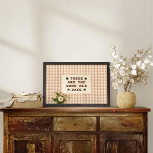 May include: A handmade wooden sign with the text "Welcome" in a playful font. The sign features a distressed white background and a dark stained wooden frame, perfect for a front door or entryway.