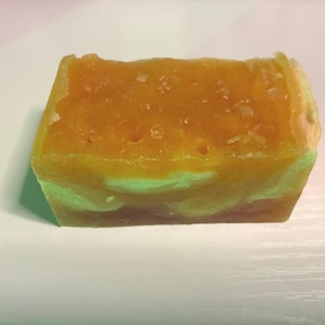 May include: A set of three ceramic mugs with a speckled, matte finish. The mugs are in shades of cream, light gray, and dark gray. Each mug has a simple, minimalist design, perfect for coffee or tea.