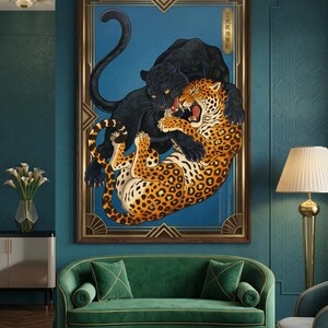 May include: A rectangular wall art print featuring a black panther and a spotted leopard in a dynamic wrestling pose against a blue background, enclosed in a gold geometric frame with Chinese characters in the upper right corner.