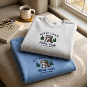Embroidered Raccoon Hiking Sweatshirt – "Out of Breath, Hiking Society" Graphic Tee