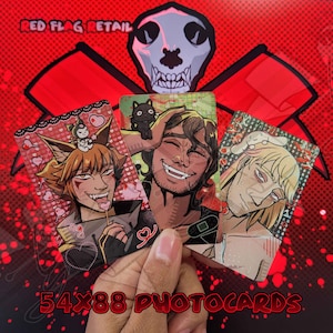 May include: Three 54x88 photocard illustrations featuring anime-style characters with unique designs. The cards are held against a red background with a skull and the text "RED FLAG RETAIL". The bottom of the image reads "54x88 PHOTOCARDS".