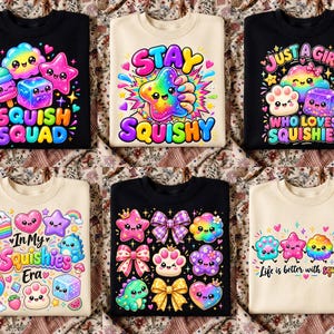 Op de afbeelding: Een collectie van zes sweatshirts in zwart en crème, elk voorzien van kleurrijke, levendige grafische prints van stripfiguren, sterren, harten en strikken met teksten zoals "Squish Squad", "Stay Squishy", "Just a Girl Who Loves Squishies", "In My Squishies Era" en "Life is better with squishies."