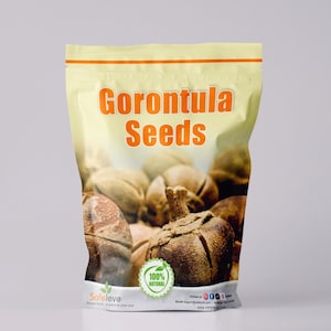 May include: A package of Gorontula Seeds, with the product name in orange letters. The bag is light yellow with a clear window showing the seeds. The seeds are brown and textured, with a 100% natural label.