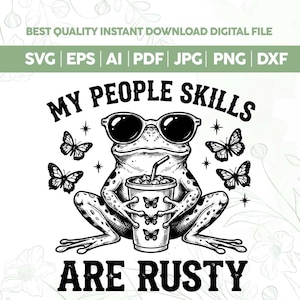 May include: A black and white digital graphic featuring a frog wearing sunglasses and holding a cup with a straw. The text reads "MY PEOPLE SKILLS ARE RUSTY". The design includes four butterflies surrounding the frog and three small butterflies on the cup.