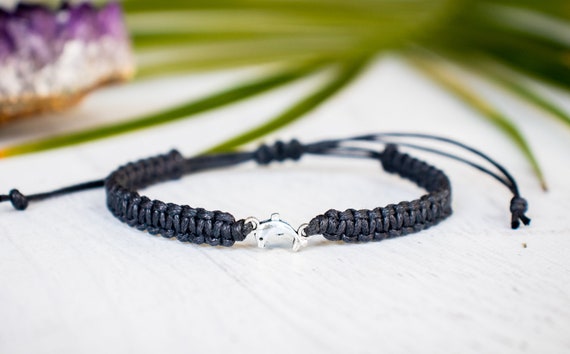 little dolphin evil eye on macrame cord little dolphin evil eye on macrame cord