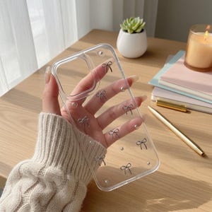 Glitter Rosett Genomskinligt Telefonskal iPhone, Sött Skal i Koreansk Stil, 3D Rosettskal, Stötsäkert Transparent Skal, Kawaii Estetiskt Telefonskal