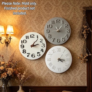 May include: Three circular silicone molds for wall clocks. One mold features raised Arabic numerals, one features raised Roman numerals, and one features raised Arabic numerals with branch-shaped hands. Text reads: Please Note: Mold only. Finished product not included.