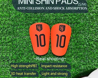 Mini espinilleras de fútbol personalizadas, protección para la selección nacional de fútbol de los Países Bajos, almohadillas ligeras de PBT.