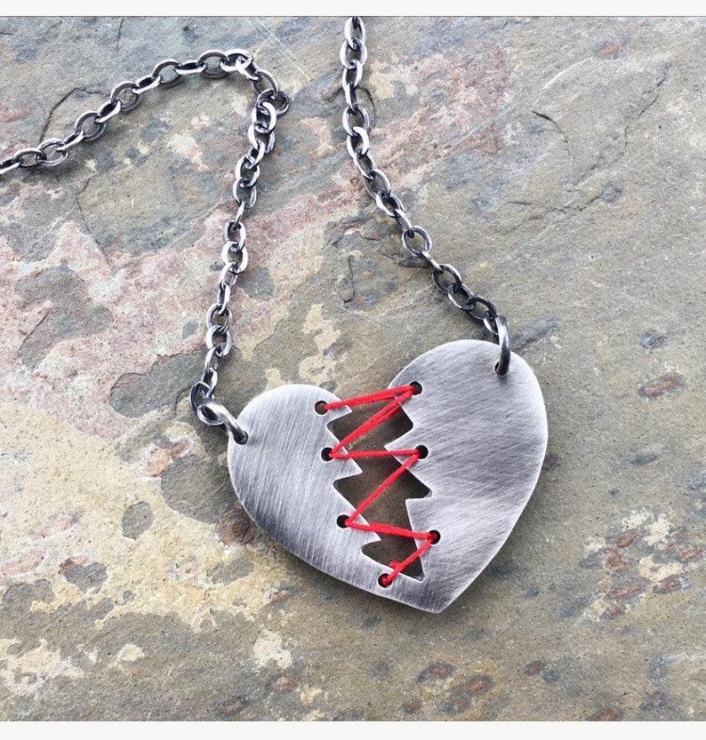 Mended Heart necklace. Sterling Silver and Thread. Etsy
