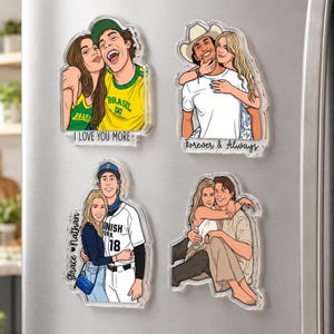 May include: Four clear acrylic magnets featuring illustrated couples. Top left: couple in yellow Brazil shirts with text I LOVE YOU MORE. Top right: couple with cowboy hat with text Forever & Always. Bottom left: couple with text grace &hearts; Nathan. Bottom right: couple.