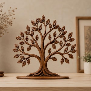 May include: A brown wooden sculpture of a tree with a symmetrical canopy of carved leaves. The tree features a thick, textured trunk that branches out into multiple limbs, each ending in detailed, pointed leaves, all mounted on a flat base.