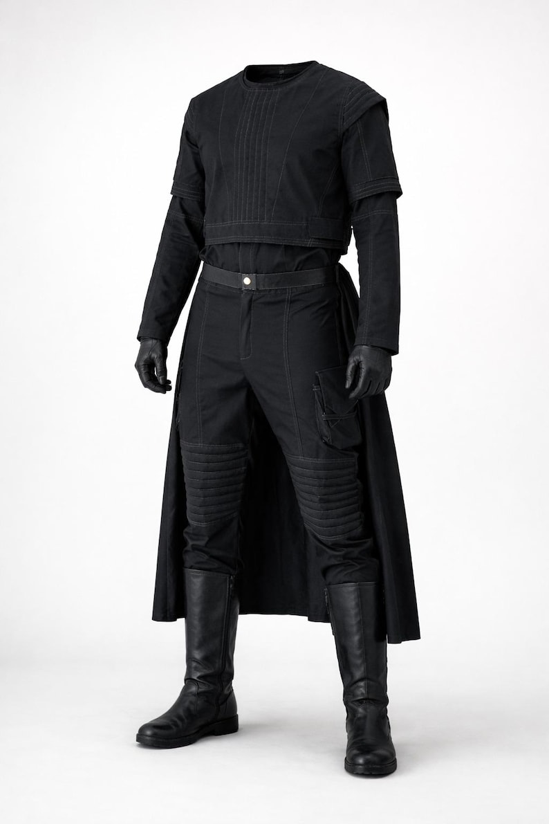 May include: A black outfit consisting of a short-sleeved top with vertical stitching, long sleeves, and matching trousers featuring ribbed knee panels, side cargo pockets, and a long back panel. The ensemble includes black gloves and tall boots.
