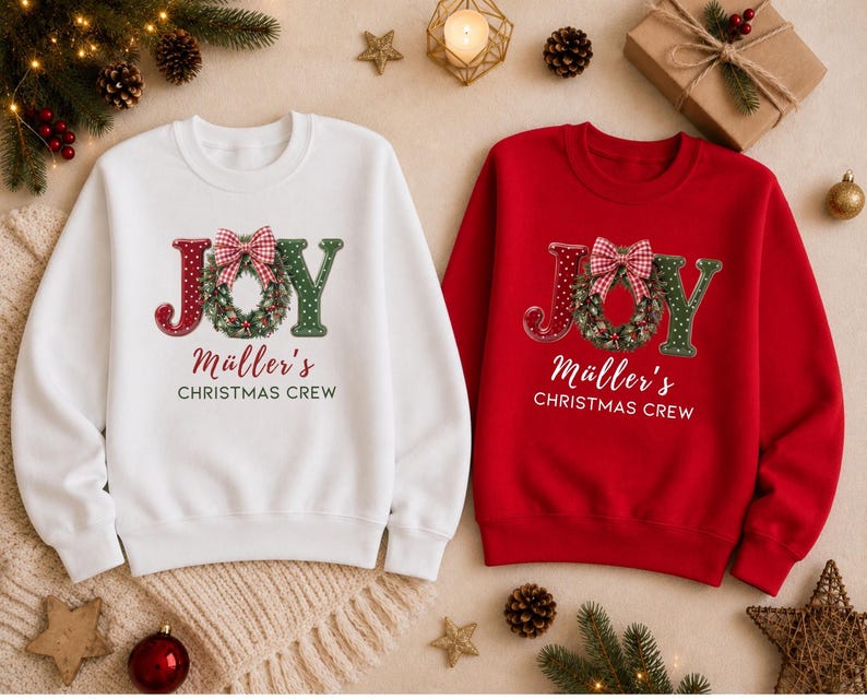 May include: A white sweatshirt and a red sweatshirt, each featuring the text JOY with a wreath replacing the O, a red and white checkered bow, and the printed text M&uuml;ller's CHRISTMAS CREW in a script and sans-serif font combination.