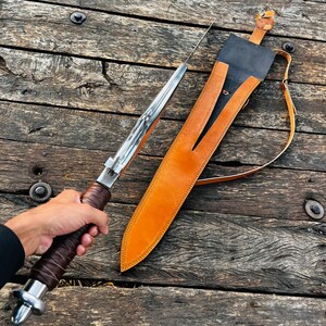 Sharp edge view of the long blade fantasy knife highlighting precision and clean finishing. The blade design includes a central groove that enhances its visual appeal while maintaining a sleek profile. A perfect addition to any collection or as a thoughtful gift for husband or loved ones.