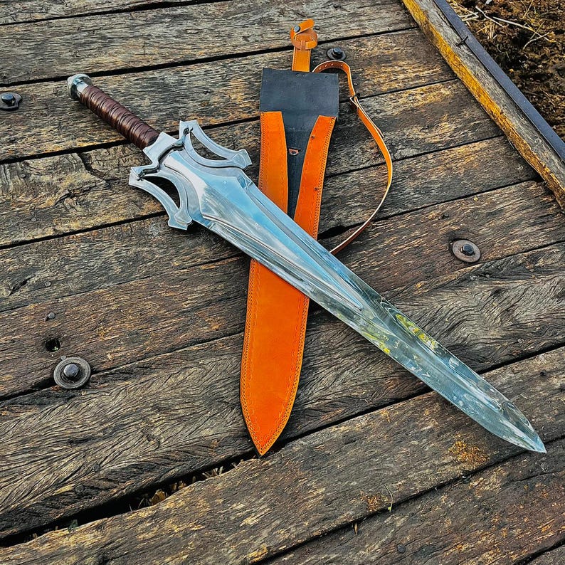 Hand holding the fantasy knife to show scale and size, giving a realistic idea of dimensions. The grip appears firm due to leather wrapping, and the blade length stands out clearly. Perfect for buyers who want size reference before purchase.