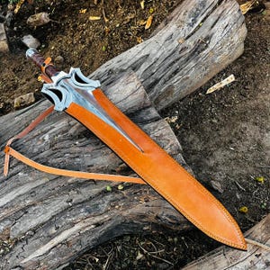 Spine view of the thick blade highlighting its structure and solid construction. The design ensures durability while maintaining a sleek appearance. A great addition for collectors who appreciate detailed craftsmanship.