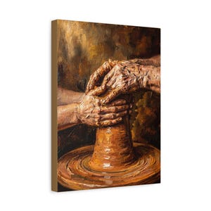May include: A canvas print of a pottery wheel in action. The artwork depicts two pairs of hands working together to shape a clay pot. The color palette is dominated by warm earth tones, with shades of brown and orange.