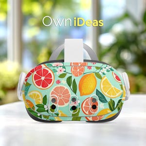 May include: VR headset with a colorful fruit pattern featuring grapefruit, lemons, and flowers on a teal background. The text "OwniDeas" is displayed above the headset.
