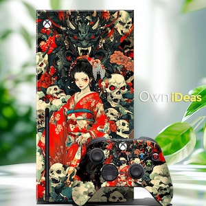 May include: A black and red video game console skin with a Japanese-inspired design featuring a woman in a red kimono, skulls, and flowers. The skin is designed for the Xbox Series X console. The image also shows a matching black and red video game controller skin.