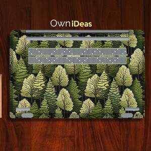 May include: A laptop skin with a forest pattern. The design features a repeating pattern of green and yellow trees on a black background. The skin is made of durable vinyl and is easy to apply and remove.
