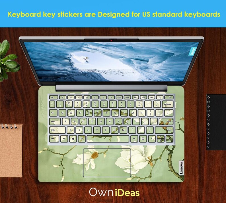May include: A laptop keyboard with a green and white floral design. The keyboard is labelled "Lenovo". The text "Keyboard key stickers are Designed for US standard keyboards" is at the top of the image. The text "Own iDeas" is at the bottom of the image.
