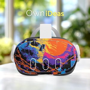 May include: VR headset with a colorful skull and chain design. The headset features a vibrant mix of blue, orange, purple, and yellow hues. The text "OwniDeas" is displayed at the top. The headset has white ear pieces and a white head strap.