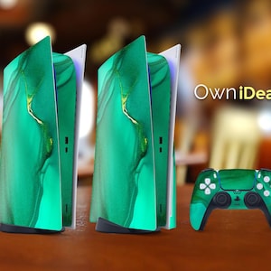 May include: Two green and gold PlayStation 5 consoles with a matching green and gold controller. The consoles have a marbled design and the text "OwnIdeas" is visible in the background.