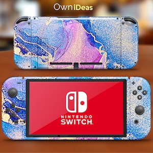 May include: A blue, purple, and gold Nintendo Switch console skin with a marble pattern. The skin is applied to the front and back of the console, as well as the Joy-Con controllers. The Nintendo Switch logo is visible on the front of the console.