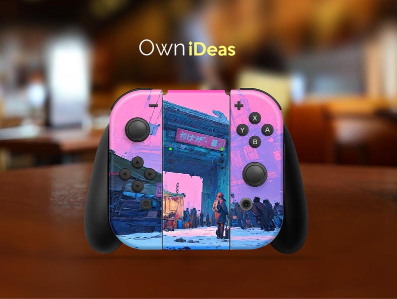 May include: A custom Nintendo Switch controller with a vibrant pink and purple cityscape design. The controller features black buttons and joysticks, with the text "OwniDeas" at the top. The design includes a Japanese-style gate and figures.