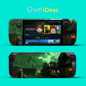 Peut inclure: Une console de jeu portable verte et noire avec un design de ville en noir et vert foncé. L'écran de la console affiche le texte "cocoon" et "Play Aperture Desk Job".