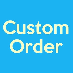 May include: A bright blue background with the words "Custom Order" in a large, light yellow font. The text is centered and clearly visible, suggesting a call to action or a product customization option.
