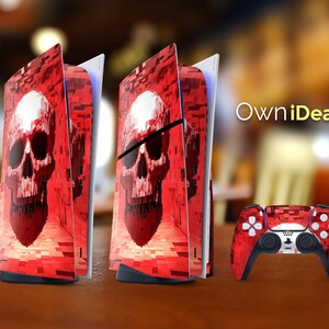 May include: A red and black skull design adorns a gaming console and controller. The console has a skull graphic on the side panels. The controller has a matching red and black pixelated design. The text "OwniIdeas" is visible.