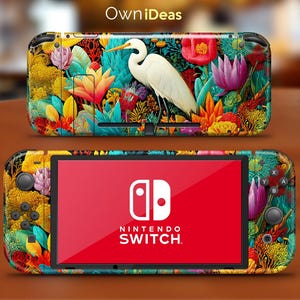 May include: A Nintendo Switch console with a vibrant, colorful floral design. The design features a white bird, red, pink, and yellow flowers, and lush green foliage. The screen displays the Nintendo Switch logo on a red background.