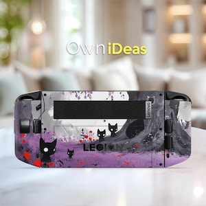 May include: A Lenovo Legion gaming console skin featuring a whimsical design with black cats, purple and red flowers, and a tree against a gray and white background. The text "LEGION" is visible.