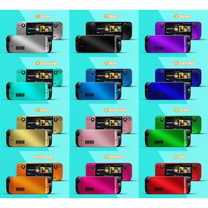 May include: A display of twelve handheld gaming consoles in a range of colours: silver, black, purple, turquoise, blue, dark blue, gold, rose gold, green, orange, hot pink, and red. Each console has a screen and control buttons.