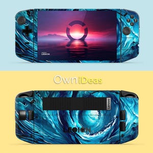 May include: A Lenovo Legion handheld gaming device with a blue and white wave design. The screen displays a sunset scene with a circular logo. The device has a black control pad and buttons. The text "Lenovo Legion" is visible.