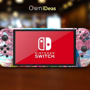 May include: A pink and blue Nintendo Switch console with a floral design. The console has a red screen with the Nintendo Switch logo and text.