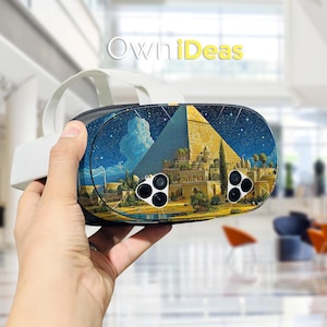 May include: A VR headset with a custom design depicting a pyramid under a starry sky. The headset is held in a hand, displaying the detailed artwork and the "OwniDeas" logo in the background.