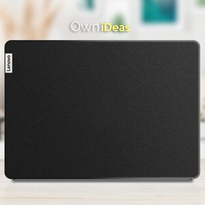 May include: A black Lenovo laptop with a textured lid. The laptop is closed and sitting on a light wood surface.