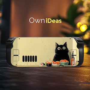 May include: A black and gold handheld gaming console skin. It features a black cat, sushi, and a sake bottle. The text "OwniIdeas" is in white. The skin has black edges. The design is on a cream background.