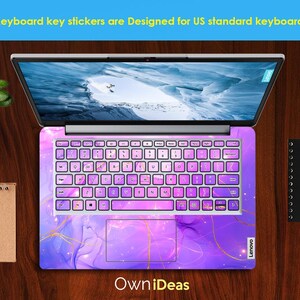 May include: Purple and gold keyboard stickers with a marble design. The stickers are designed for US standard keyboards. The text "Own iDeas" and "Lenovo" are visible on the stickers.