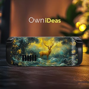 May include: A black handheld gaming console with a custom skin depicting a golden deer in a forest. The skin has a yellow and teal colour scheme, with the white text "OwniIdeas".